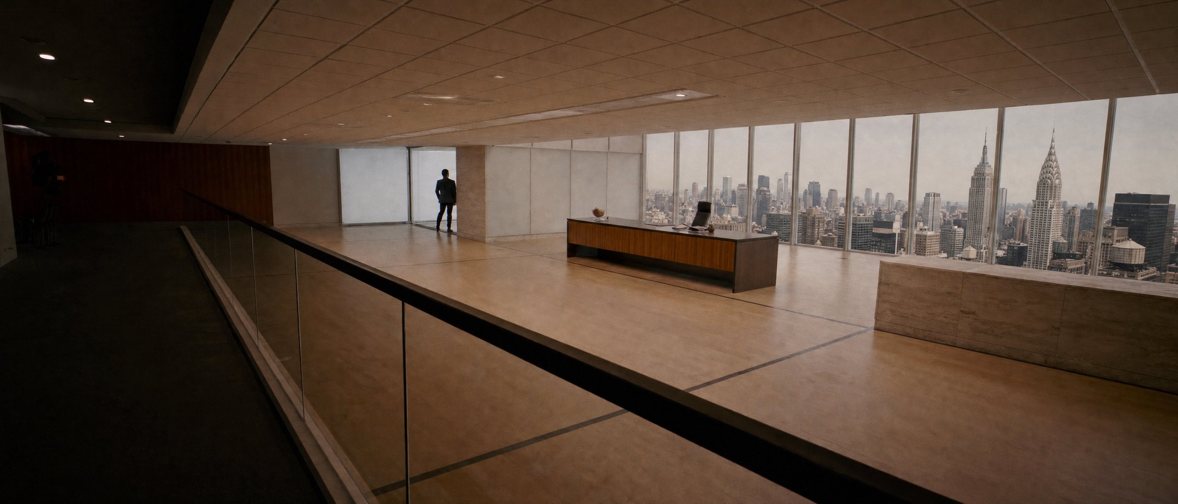 Manhattan corner office with a walnut executive desk and the New York skyline beyond floor to ceiling glass